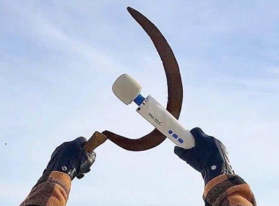 Gloved hands hold up a crossed vibrator and sickle in a parody of the communist symbol