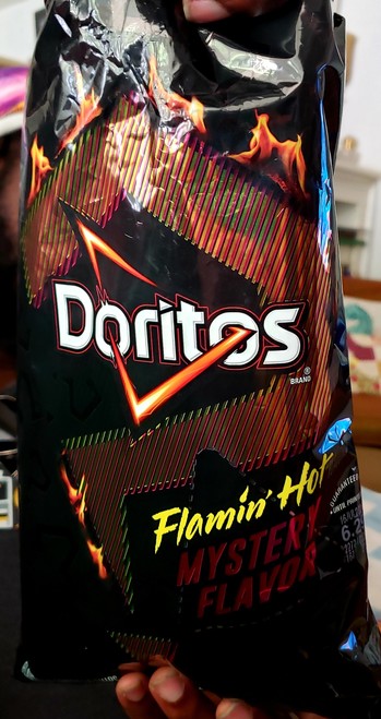 A bag of Flaming Hot Doritos Mystery Flavor.