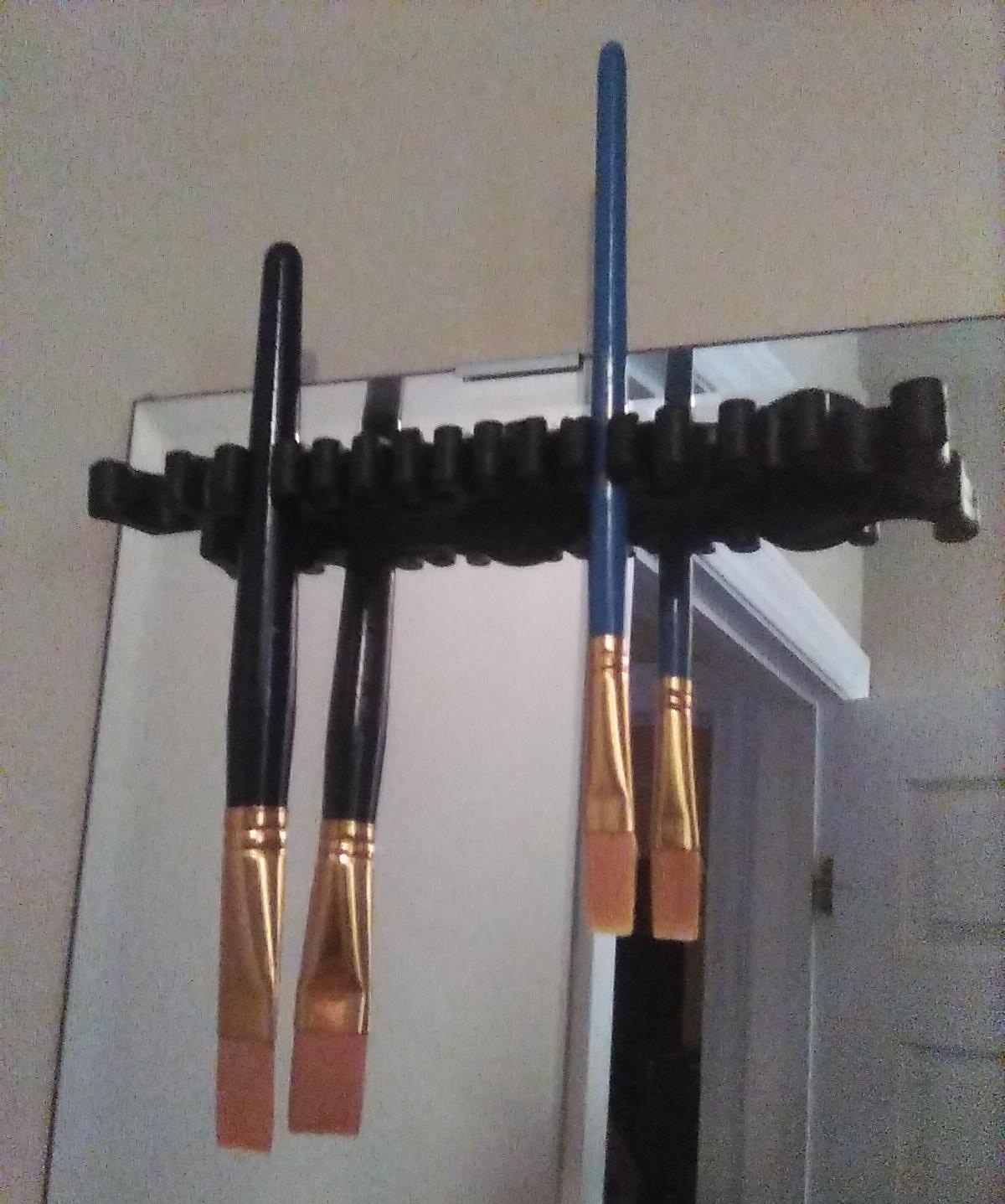 black rubber brush rack with suction cups