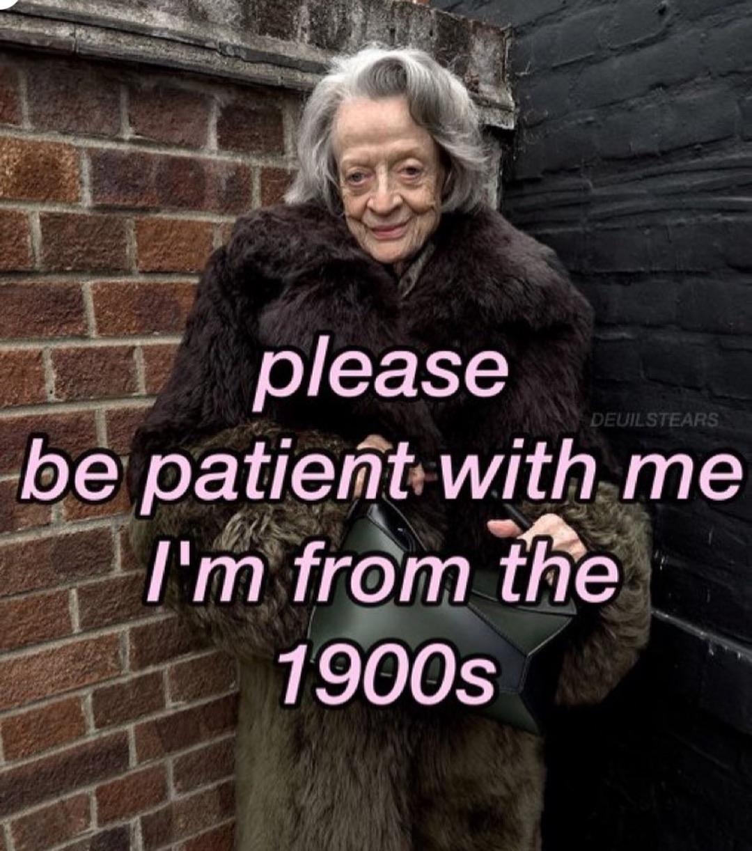 Meme post. Photo of a lively-eyed octogenarian with nice gray hair a bit fluffed up and brushed. Meme text: Please be patient with me. I’m from the 1900’s.