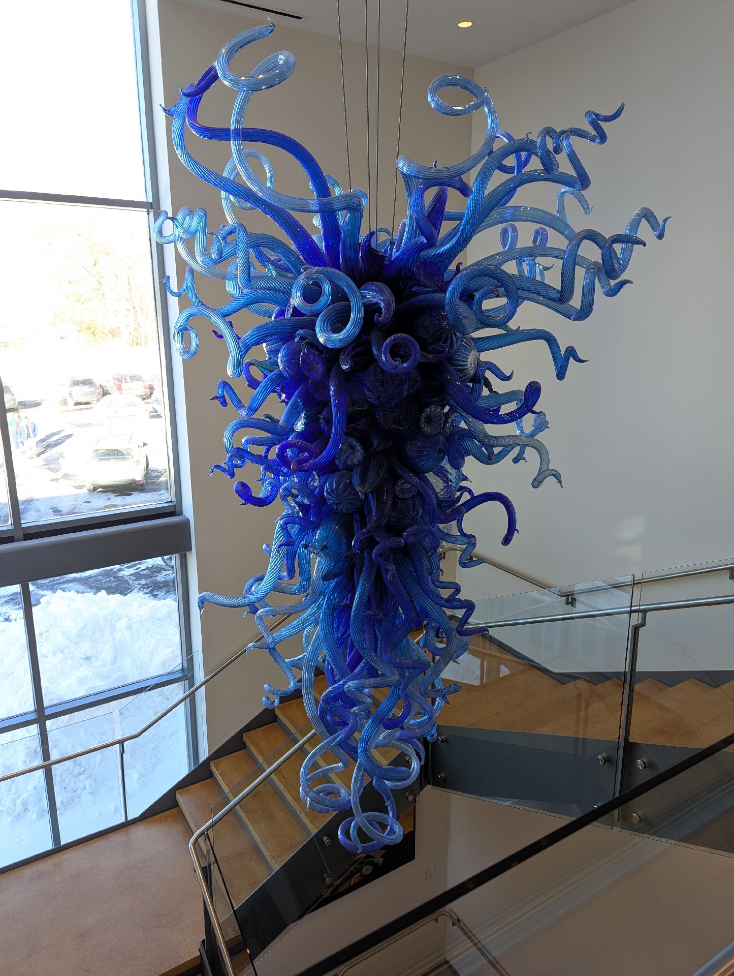 An incredibly cool hanging art feature at the museum full of swirling blue glass
