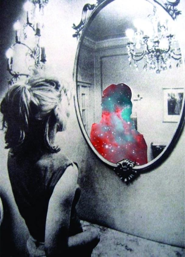 woman looking in mirror, seeing reflection as colorful, star-filled galaxy — source unknown