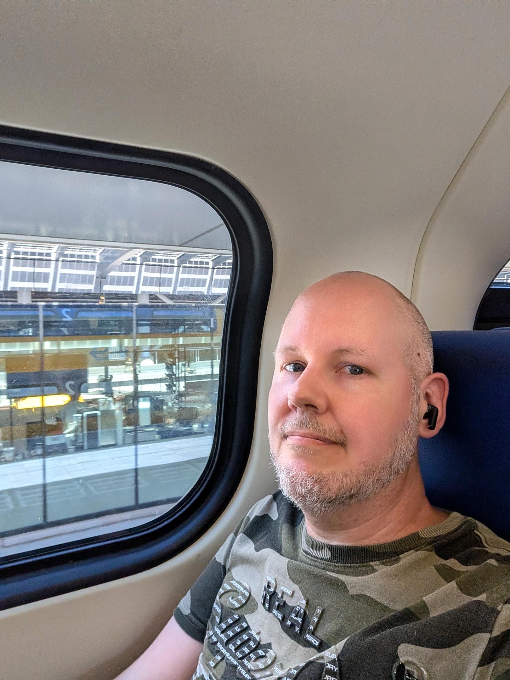 Me in the train near the window.